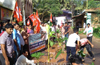 CPI(M), DYFI activists plant saplings to protest bad road at Jeppinamogaru